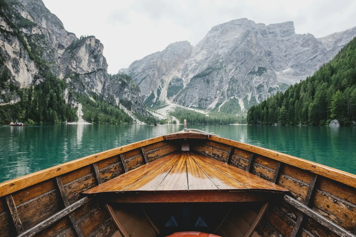 Wooden boat on a mountain lake